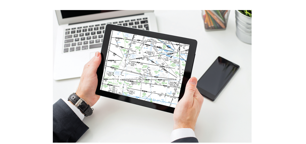 A learner exhibits deliberate practice by plotting courses for his next training flight.