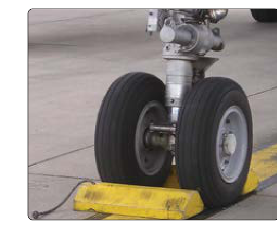 Wheels chocked fore and aft.