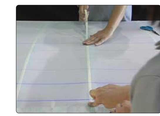 Reinforcing tape the same width as the wing ribs is applied over all wing ribs.