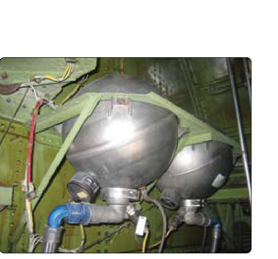 Built-in non-portable fire extinguisher containers (HRD bottles) on an airliner.