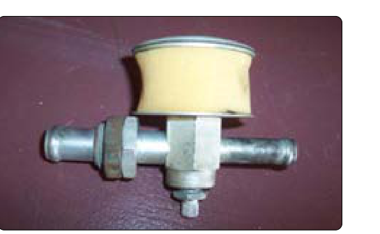 A vacuum regulator, also known as a suction relief valve, includes a foam filter. To relieve vacuum, outside air of a higher pressure must be drawn into the system. This air must be clean to prevent damage to the pump.