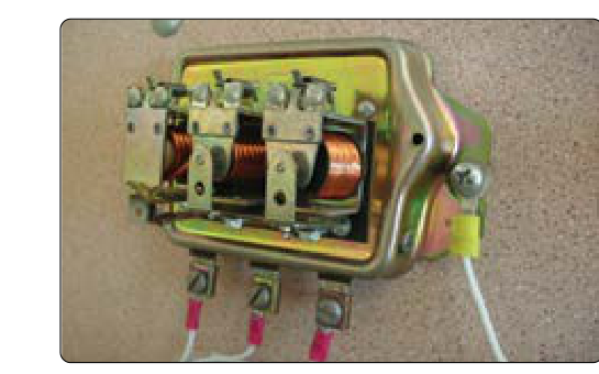 The three relays found on this regulator are used to regulate voltage, limit current, and prevent reverse current flow.